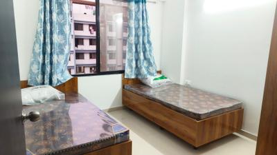 Bedroom Image of 450 Sq.ft 1 BHK Apartment / Flat for rent in APAK Ajinkya Towers, Charholi Budruk Pune for Rs. 17000