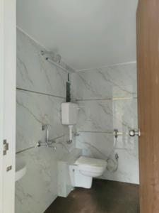 Common Bathroom Image of 620 Sq.ft 1 BHK Apartment / Flat for sale in KK Radha Nilaya, Bapane Mumbai for Rs. 3250000