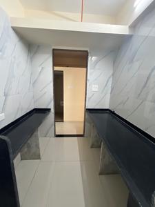 Kitchen Image of 990 Sq.ft 2 BHK Apartment / Flat for sale in Mohan Willows III, Badlapur East Badlapur for Rs. 4000000