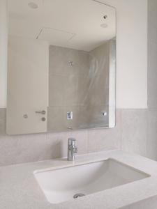 Common Bathroom Image of 1296 Sq.ft 2 BHK Apartment / Flat for sale in Ireo The Corridors, Sector 67 Gurgaon for Rs. 23000000