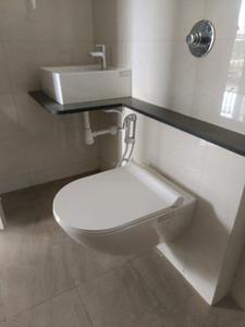 Common Bathroom Image of 1025 Sq.ft 2 BHK Apartment / Flat for sale in Grandbay Ramaa Heritaige Phase 2, Handewadi Pune for Rs. 4700000