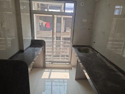 Kitchen Image of 700 Sq.ft 1 BHK Apartment / Flat for sale in Pushpak Nagar Navi Mumbai for Rs. 4000000