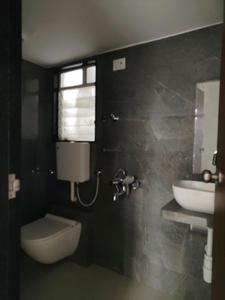 Common Bathroom Image of 695 Sq.ft 2 BHK Apartment / Flat for sale in Mansarovar Pearl Gardens, Vasai West Vasai for Rs. 7400000