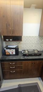 Kitchen Image of 918 Sq.ft 3 BHK Apartment / Flat for rent in Urbanrise Revolution One, Padur Chennai for Rs. 35000
