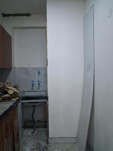Kitchen Image of 1050 Sq.ft 2 BHK Apartment / Flat for sale in Sector 49 Noida for Rs. 3800000