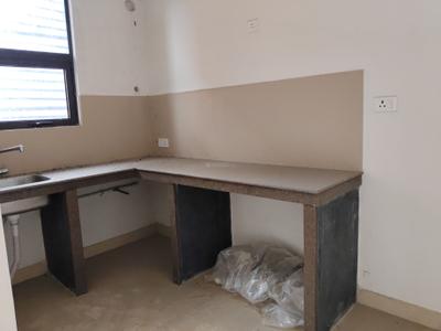 Kitchen Image of 1000 Sq.ft 2 BHK Apartment / Flat for sale in Ambuja Ecospace Residencia, New Town Kolkata for Rs. 12500000