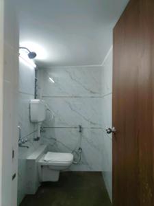 Common Bathroom Image of 670 Sq.ft 2 BHK Apartment / Flat for sale in Visharia Sadguru Tower Bldg No 2, Makane Kapase Mumbai for Rs. 2205000