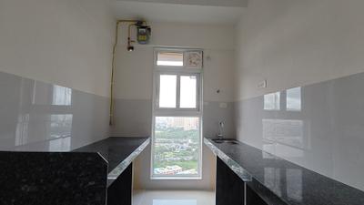 Kitchen Image of 620 Sq.ft 1 BHK Apartment / Flat for rent in Ashar Arize, Kalwa Thane for Rs. 28000