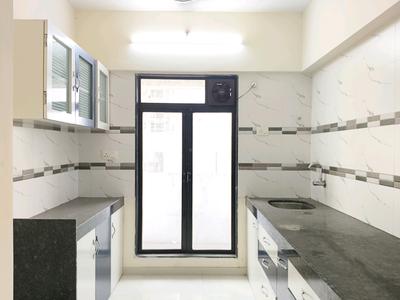 Kitchen Image of 650 Sq.ft 1 BHK Apartment / Flat for rent in Dynamic Crest Phase I Rimo Everest, Khidkali Thane for Rs. 14000