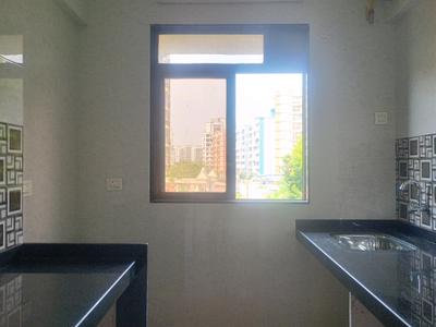 Kitchen Image of 785 Sq.ft 1 BHK Apartment / Flat for sale in Sai Om Sai Towers, Ambernath East Ambernath for Rs. 2575000