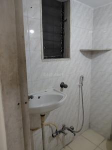Bathroom Image of 950 Sq.ft 2 BHK Apartment / Flat for rent in Shashwat Athashree, Kopar Khairane Navi Mumbai for Rs. 42000
