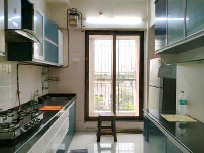 Kitchen Image of 648 Sq.ft 2 BHK Apartment / Flat for sale in Rajaram Sukur Enclave, Kasarvadavali Thane for Rs. 9500000