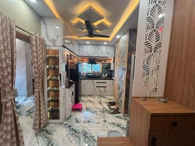 Kitchen Image of 930 Sq.ft 3 BHK Apartment / Flat for sale in Baguiati Kolkata for Rs. 4100000