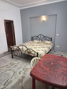 Bedroom Image of 700 Sq.ft 1 BHK Independent House for rent in Sector 51 Noida for Rs. 25000