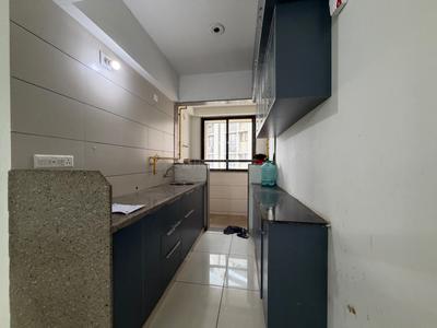 Kitchen Image of 950 Sq.ft 1.5 BHK Apartment / Flat for rent in Sun Rising Homes, Gota Ahmedabad for Rs. 17500