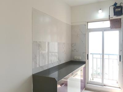 Kitchen Image of 650 Sq.ft 1 BHK Apartment / Flat for rent in Vihang Valley, Kasarvadavali Thane for Rs. 22000