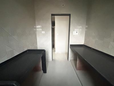 Kitchen Image of 680 Sq.ft 1 BHK Apartment / Flat for sale in Sai Balaji Gopal, Dombivli East Thane for Rs. 4200000