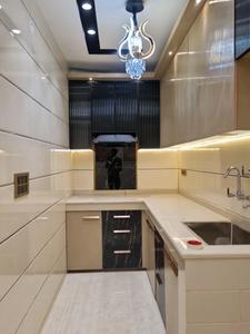 Kitchen Image of 1150 Sq.ft 4 BHK Apartment / Flat for sale in Razapur Khurd New Delhi for Rs. 8000000