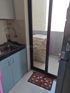 Kitchen Image of 900 Sq.ft 2 BHK Apartment / Flat for sale in Shapoorji Pallonji Joyville Sensorium, Maan Pune for Rs. 9000000