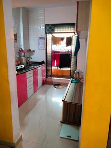 Kitchen Image of 920 Sq.ft 2 BHK Apartment / Flat for sale in Krishna Om Krishna Heights, Badlapur East Badlapur for Rs. 4000000