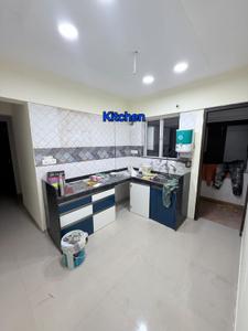 Kitchen Image of 1050 Sq.ft 2 BHK Apartment / Flat for rent in Mayuri Optimum, Pisoli Pune for Rs. 16500
