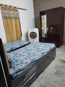 Bedroom Image of Pg for girls in New Industrial Township, Faridabad