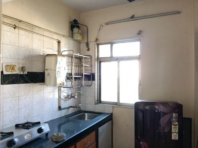 Kitchen Image of 600 Sq.ft 1 BHK Apartment / Flat for rent in Puraniks Kanchan Pushp Society, Hiranandani Estate Thane for Rs. 18000