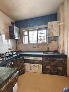 Kitchen Image of 850 Sq.ft 2 BHK Apartment / Flat for rent in Chintan Kudale Patil Towers, Anand Nagar, Sinhagad Road Pune for Rs. 30000