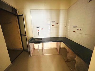 Kitchen Image of 680 Sq.ft 1 BHK Apartment / Flat for rent in Dombivli East Thane for Rs. 11000