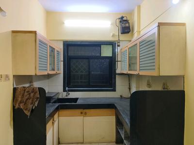 Kitchen Image of 950 Sq.ft 2 BHK Apartment / Flat for rent in Shree Omkar CHS, Dombivli East Thane for Rs. 18000