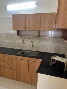 Kitchen Image of 1250 Sq.ft 3 BHK Apartment / Flat for sale in Vaikund Sundaram Apartment, Karapakkam Chennai for Rs. 8500000