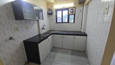 Kitchen Image of 500 Sq.ft 1 BHK Apartment / Flat for sale in Kabra Maheshwari Nagar, Andheri East Mumbai for Rs. 13000000