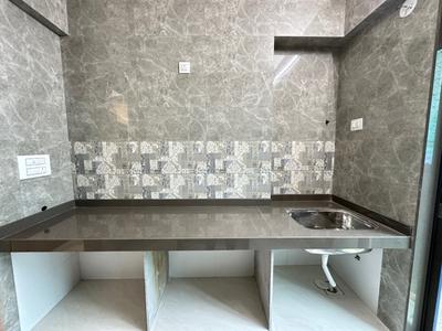 Kitchen Image of 620 Sq.ft 1 BHK Apartment / Flat for sale in Thakurli Thane for Rs. 4743000