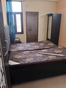 Bedroom Image of 850 Sq.ft 2 BHK Builder Floor for rent in Sector 62A Noida for Rs. 22000