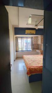 Bedroom Image of 610 Sq.ft 1 BHK Apartment / Flat for rent in Gokul GalaxyHousing, Kandivali East Mumbai for Rs. 35000