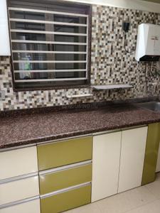 Kitchen Image of 990 Sq.ft 2 BHK Apartment / Flat for sale in Ramdev Nagar Ahmedabad for Rs. 7000000