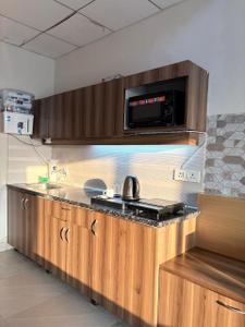 Kitchen Image of 435 Sq.ft 1 RK Studio for rent in Paramount Pine And Oak Studio, Surajpur Greater Noida for Rs. 15000