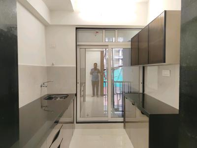 Kitchen Image of 830 Sq.ft 2 BHK Apartment / Flat for sale in Shripal Sattva, Vasai West Vasai for Rs. 6940000