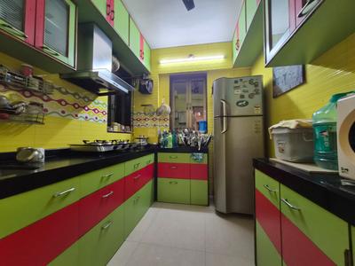 Kitchen Image of 931 Sq.ft 2 BHK Apartment / Flat for sale in Swaraj Planet, Kopar Khairane Navi Mumbai for Rs. 14000000