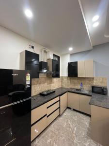 Kitchen Image of 650 Sq.ft 1 BHK Builder Floor for rent in Sector 52A Gurgaon for Rs. 45000