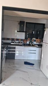 Kitchen Image of 850 Sq.ft 2 BHK Apartment / Flat for rent in Tanish Orchid, Charholi Budruk Pune for Rs. 17000