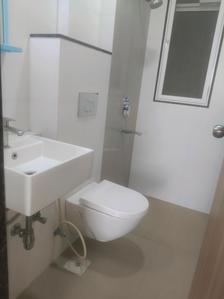Common Bathroom Image of 550 Sq.ft 1 BHK Apartment / Flat for sale in Godrej Tranquil, Kandivali East Mumbai for Rs. 9700000