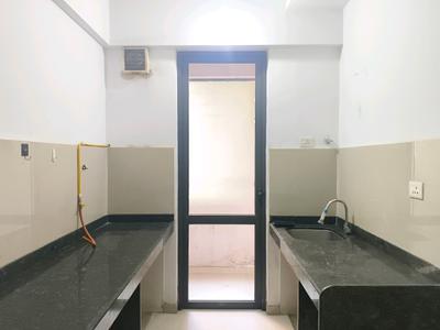 Kitchen Image of 720 Sq.ft 1 BHK Apartment / Flat for rent in Lodha Lakeshore Greens, Palava Phase 2 Thane for Rs. 10500