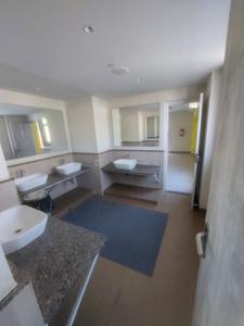 Bathroom Image of 875 Sq.ft 2 BHK Apartment / Flat for sale in Sattva Ashraya, Lakshmisagara Bengaluru for Rs. 6500000