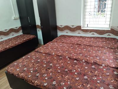 Bedroom Image of Radhe Krishna Pg in Memnagar, Ahmedabad