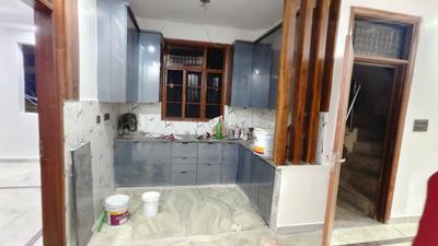Kitchen Image of 850 Sq.ft 2 BHK Builder Floor for rent in Sector 24 Rohini New Delhi for Rs. 25000