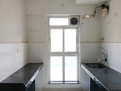 Kitchen Image of 700 Sq.ft 1.5 BHK Apartment / Flat for rent in Godrej Emerald, Kasarvadavali Thane for Rs. 26500