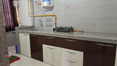 Kitchen Image of 950 Sq.ft 1 BHK Apartment / Flat for rent in Surya Kiran Aakash Homes, Ujala Circle Ahmedabad for Rs. 23000