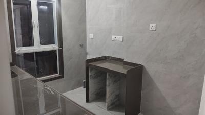 Kitchen Image of 672 Sq.ft 2 BHK Apartment / Flat for sale in Digam Poonam CHSL, Borivali East Mumbai for Rs. 17900000