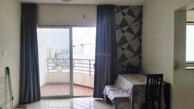 Living Room Image of 1050 Sq.ft 2 BHK Apartment / Flat for sale in Ajmera Exotica, Wagholi Pune for Rs. 7500000